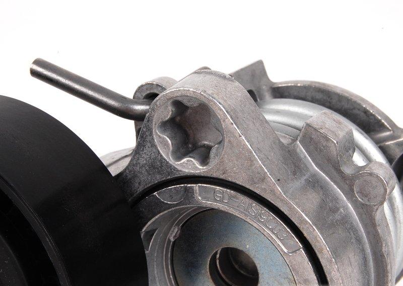 Натяжной ролик с натяжн. приспособлением