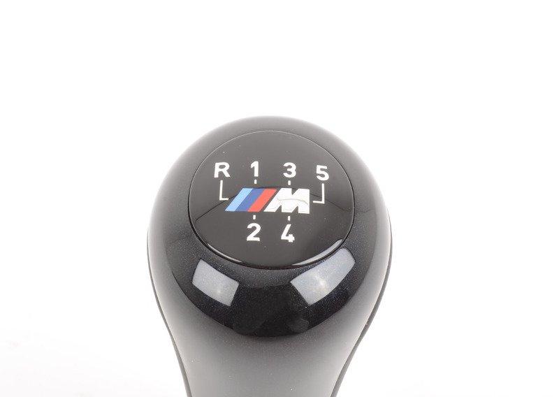 Головка рычага ПП кожа/эмблема M/5-ступ.