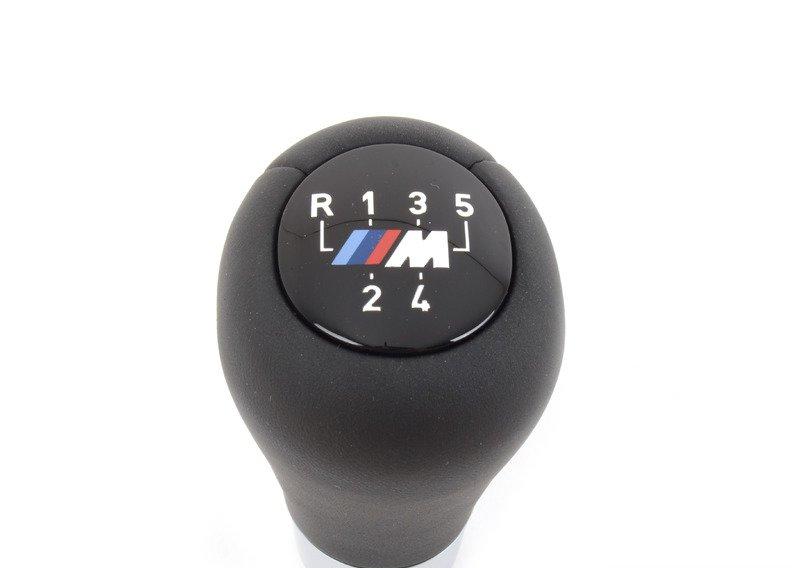 Головка рычага ПП кожа/эмблема M/5-ступ.