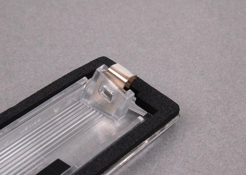 Рассеиватель фонаря подсв.номерн.знака