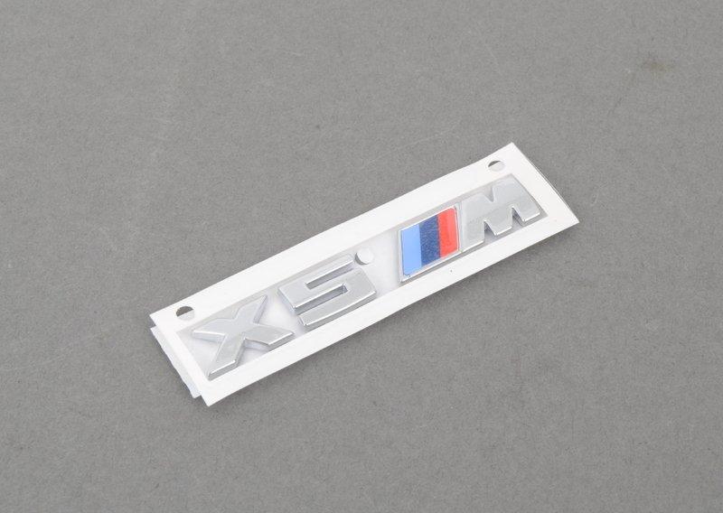 Эмблема X5M на рештку радиатора