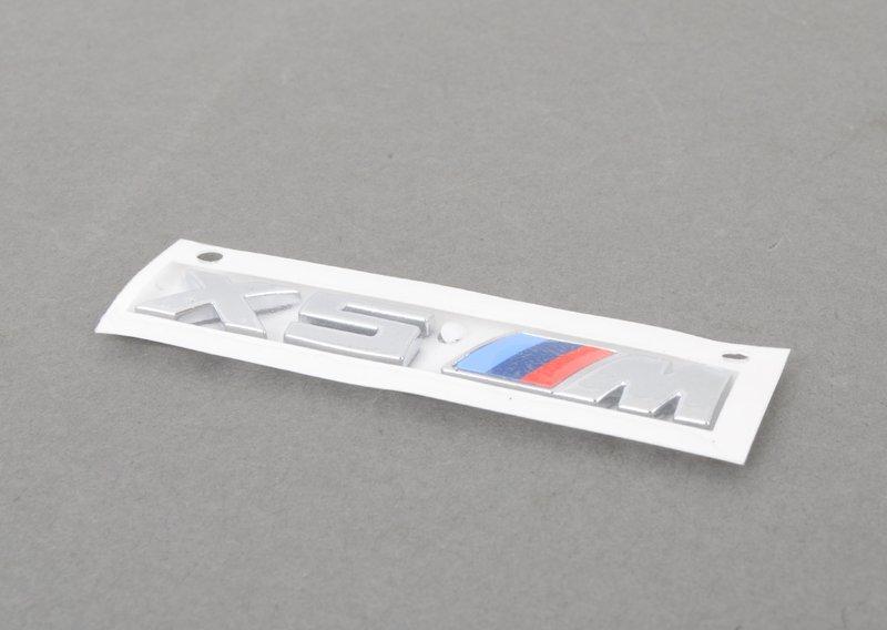 Эмблема X5M на рештку радиатора