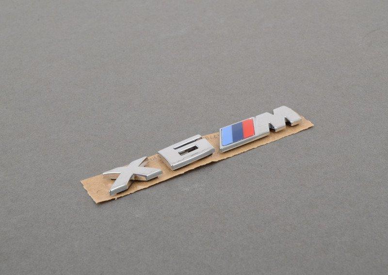 Эмблема передн.декор.решетки радиат.лев.