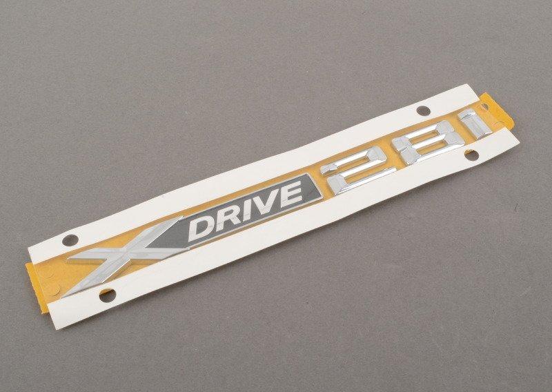 E84/F25 эмблема X Drive 28i