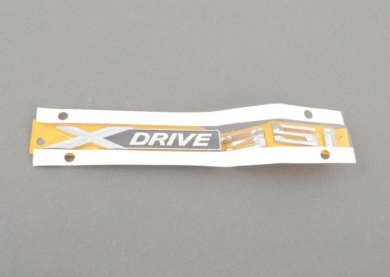 E53 трос капота средний