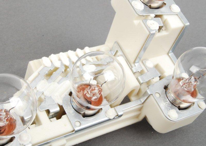 Держ.лампы в блоке зад.фон.в крыле Л