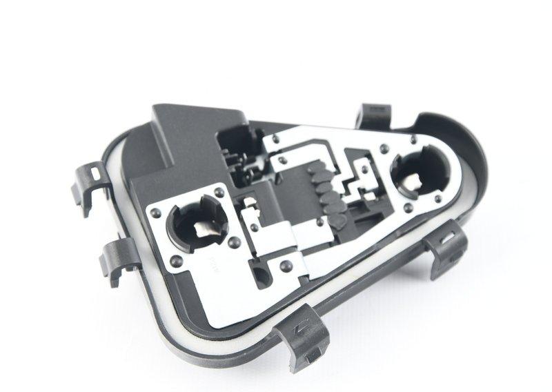 Держ.лампы в блоке зад.фон.в крыле Л