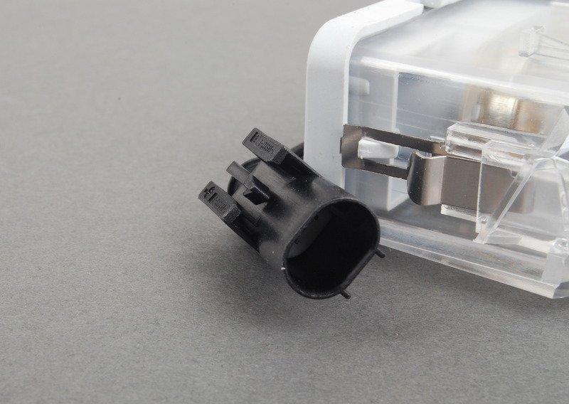 Фонарь подсветки номерного знака