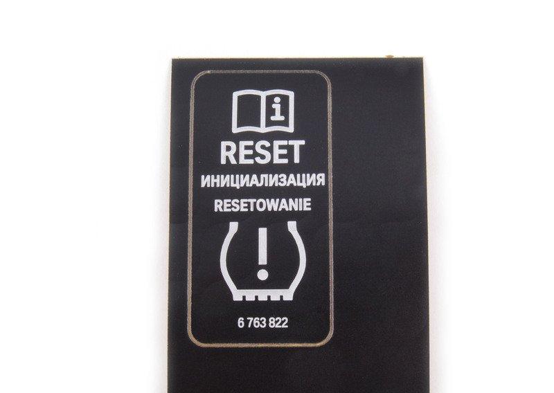 Шильдик Reset